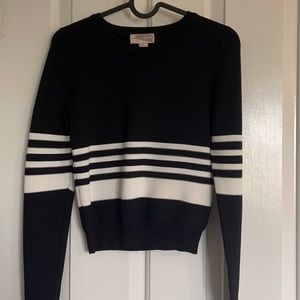 Fitted black and white striped sweater